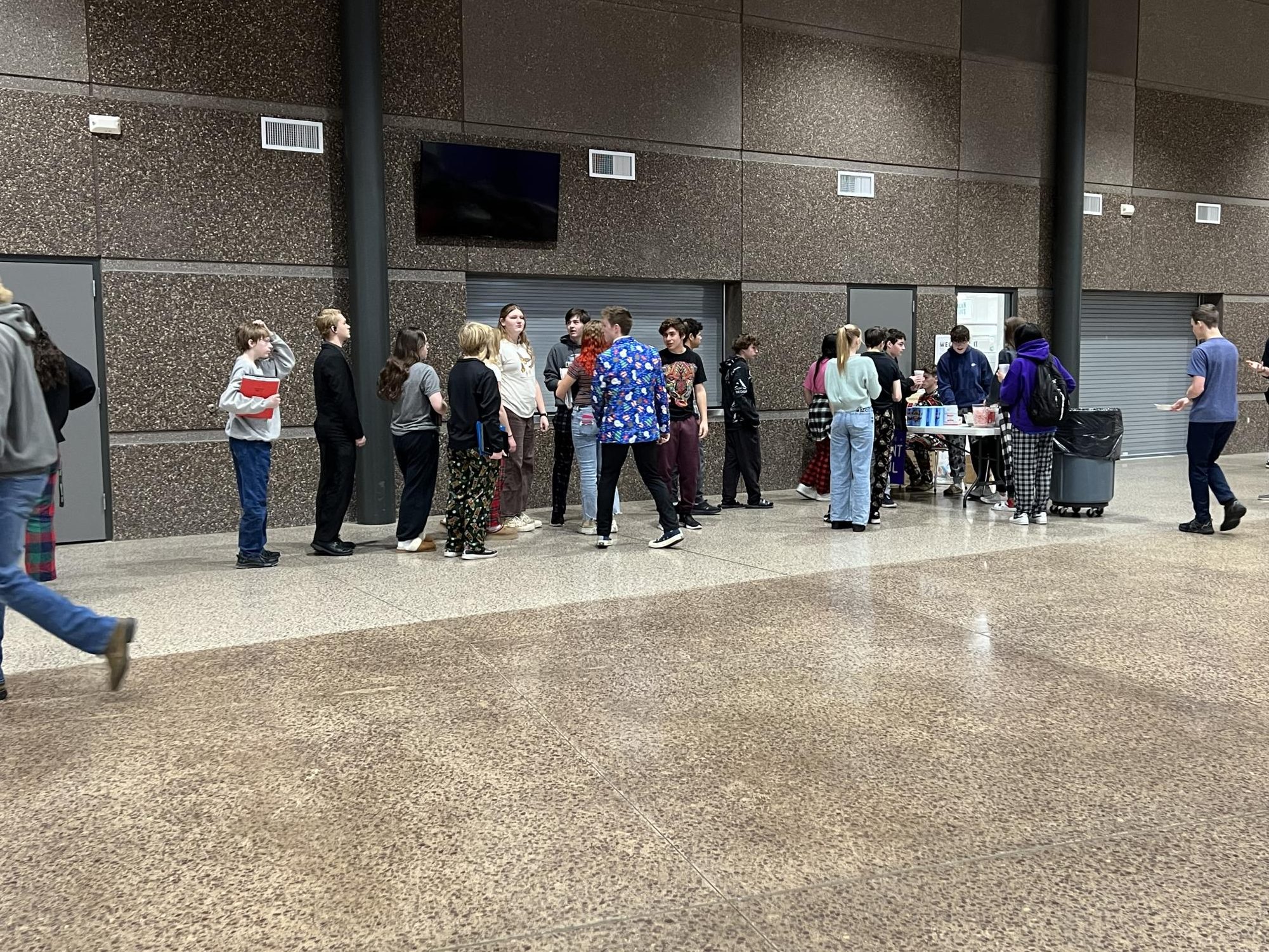 NUHS students line up for some delicious Hot Cocoa