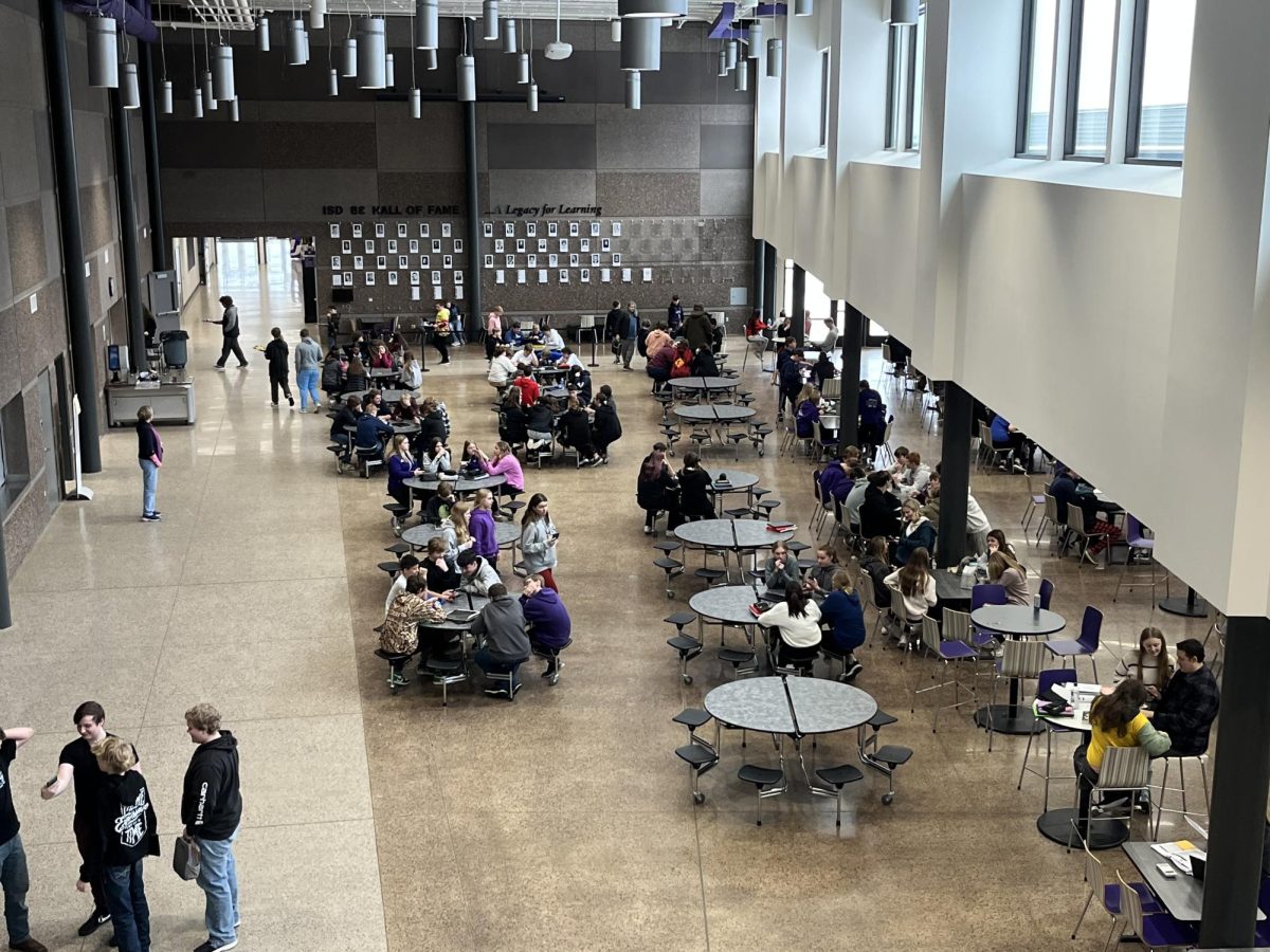 Students eating the the cafeteria of New Ulm High School. 