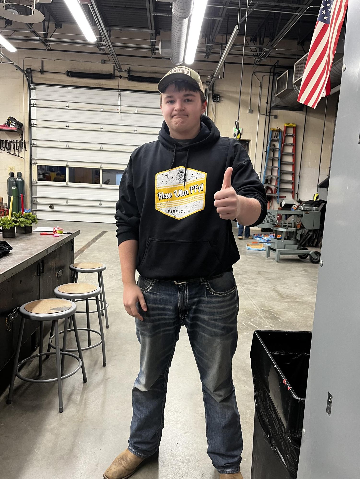 Sophomore Logan Platz wearing the new New Ulm FFA clothing the morning of pick up. 