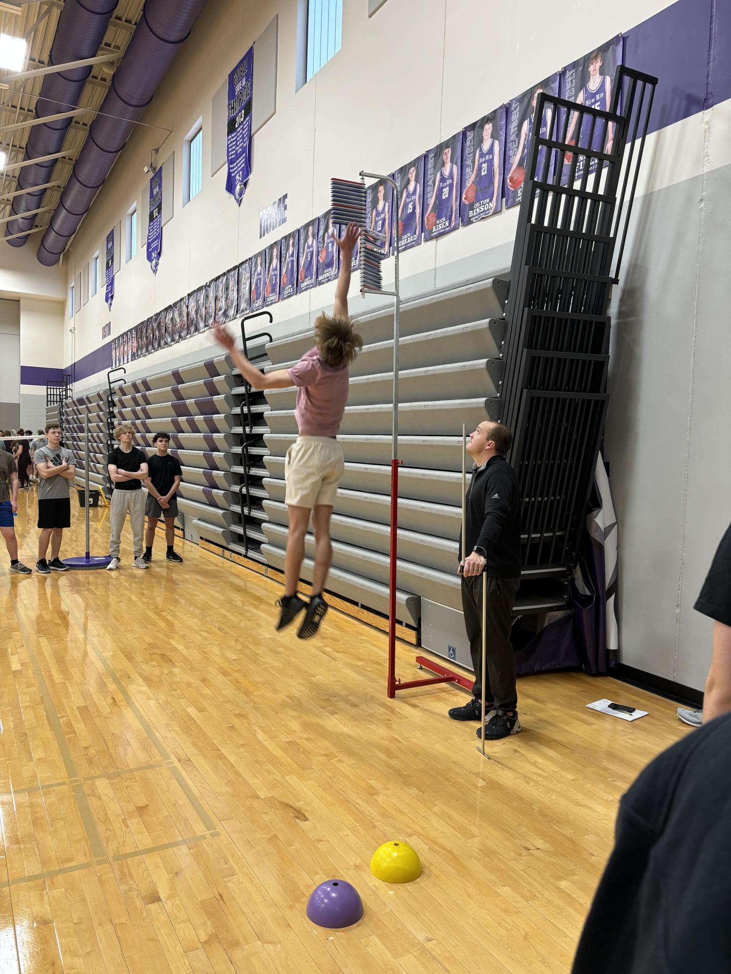 Junior Tayden Moldan tests his vertical in the gymnasium.