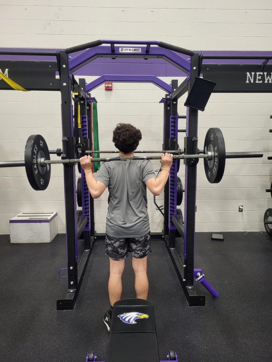 NUHS student Julian Hanson doing his eccentric back squats during strength and conditioning.