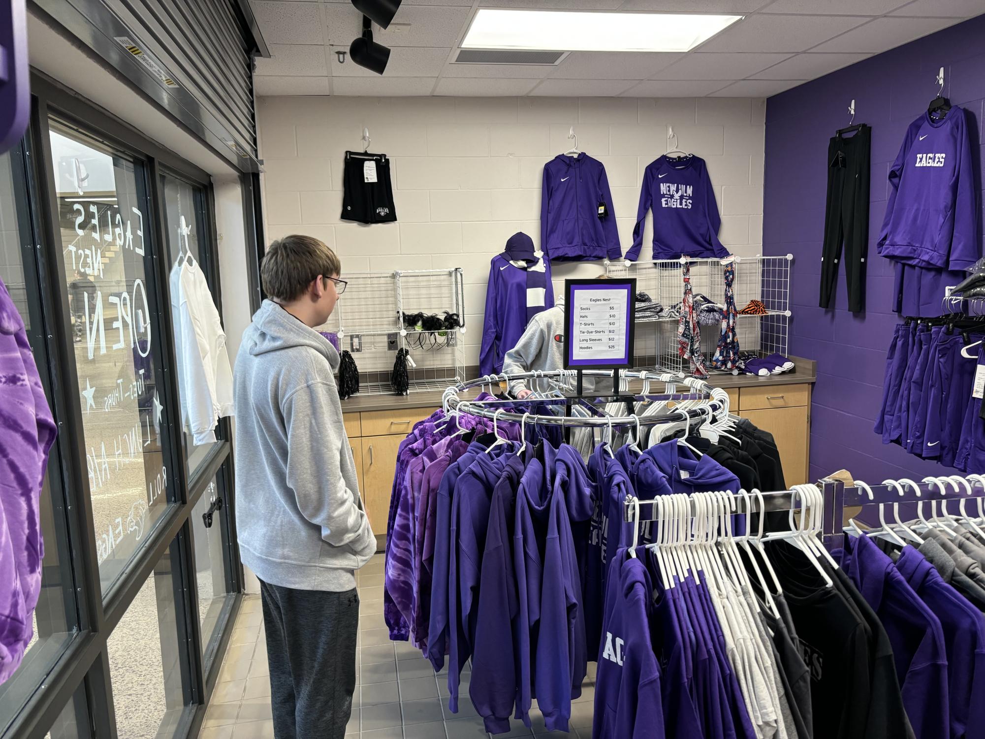 Seniors Ethan Neet and Brennan Benson shopping in the NUHS School Store on Thursday Feb. 2. The store has a wide variety of quality items available  for purchase, said Brennan B. With the start of the new semester comes a new group of students to manage the store and its inventory, meaning lots of new items for sale in the upcoming months. 
