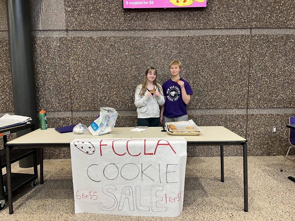 Luka Deree, senior and Summer Clark, junior helping out with the FCCLA cookie sale
