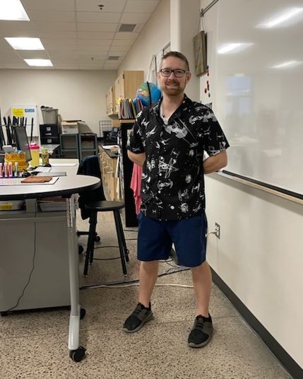 Mr. Mans wearing a space themed shirt for Tourist day and NUHS.