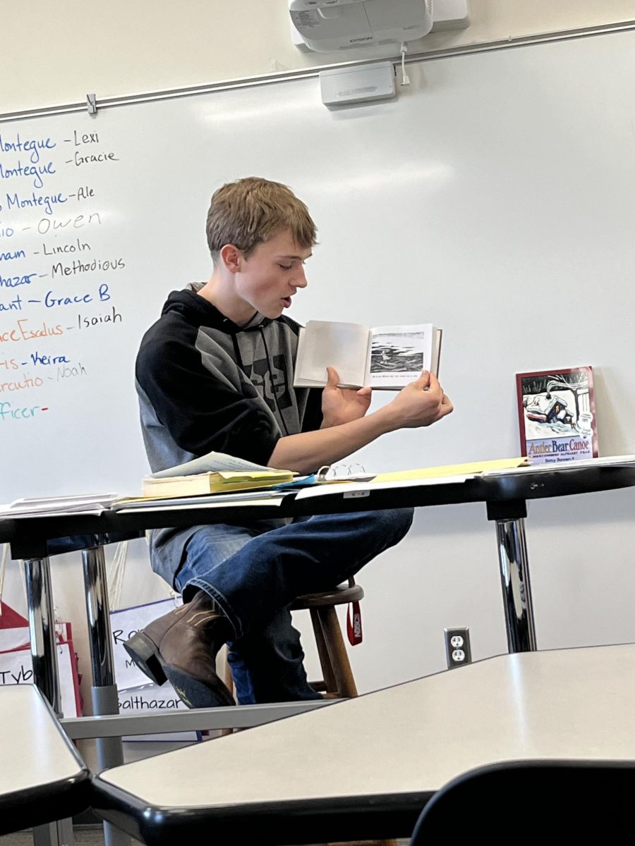 (Senior) Aiden Gieseke read the Gashlycrumb Tinies by Edward Gorey to the Literature of Diversity class during his free time. 