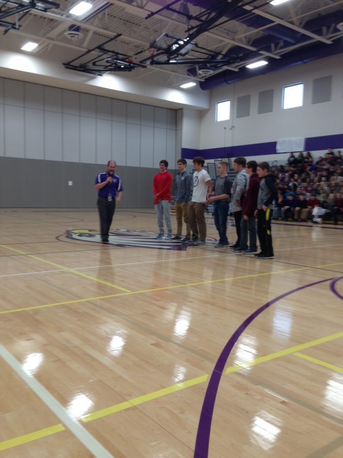 The Wrestling Crew being honored at the Pep Fest on their solid season.