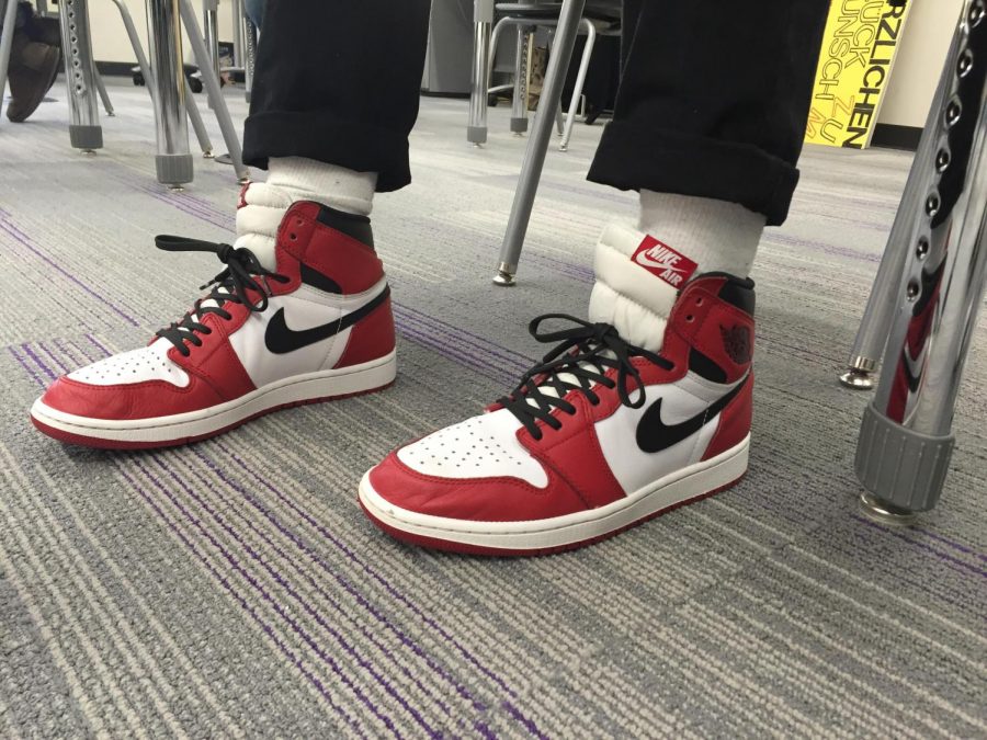 SWEET SNEAKS- Junior Noah Hauge sports a stylin pair of Jordan Chicago Ones.