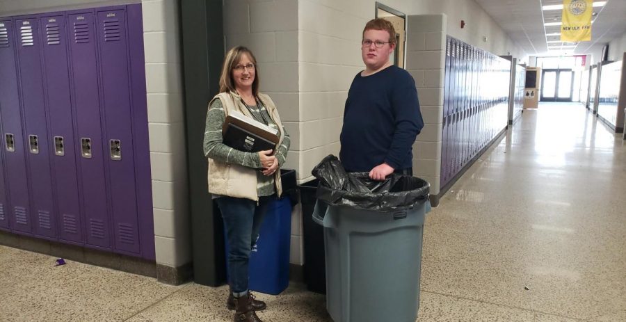 WORK IN PROGRESS - Senior Erik Zobel and Kathy Wendland herself pause their work to pose for a picture.