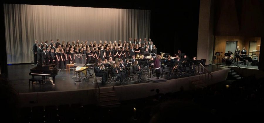 Concert Band and all three choirs get ready to perform Greatest Showman