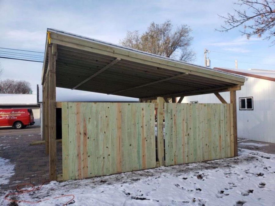 Construction crew built this two-car garage port.