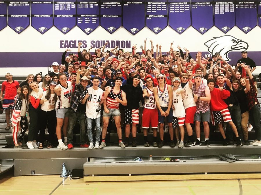 NUHS students cheering on the girls volleyball team