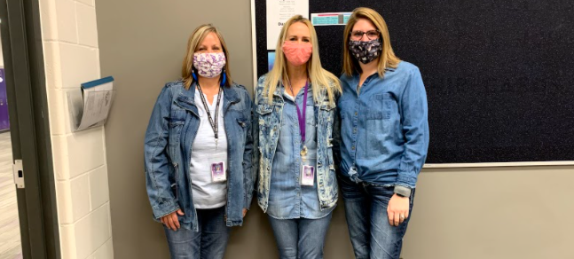 Paraprofessionals at New Ulm High School (left to right) Kathy Wendland, Bobbie Altmann, Kelsey Clobes participating in the homecoming dress-up day, double denim, on Tuesday. "I am glad that the kids get to have some normalcy this year by having the dress-up days and coronation, but I am sad for them, I wish that everything could be back to normal for their sake," Wendland said. 