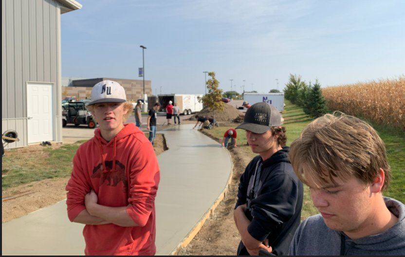 The Carpentry 1 class was seen on a Friday coming in to help and learn how to pour concrete for the school. Senior Evan Wiltscheck said, "It was a fun and new experience that I think everyone learned a lot from." The class did everything from the pouring and spreading to the texture and rebar. 