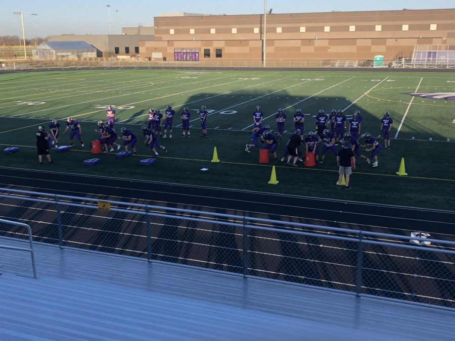 With only a few games left of the season, the football team is pushing themselves harder each practice. Doing as many drills as they can, making each other stronger players, and working harder as a team. Coach Kauffman is pushing them til they hit their limits, making them all better players. 