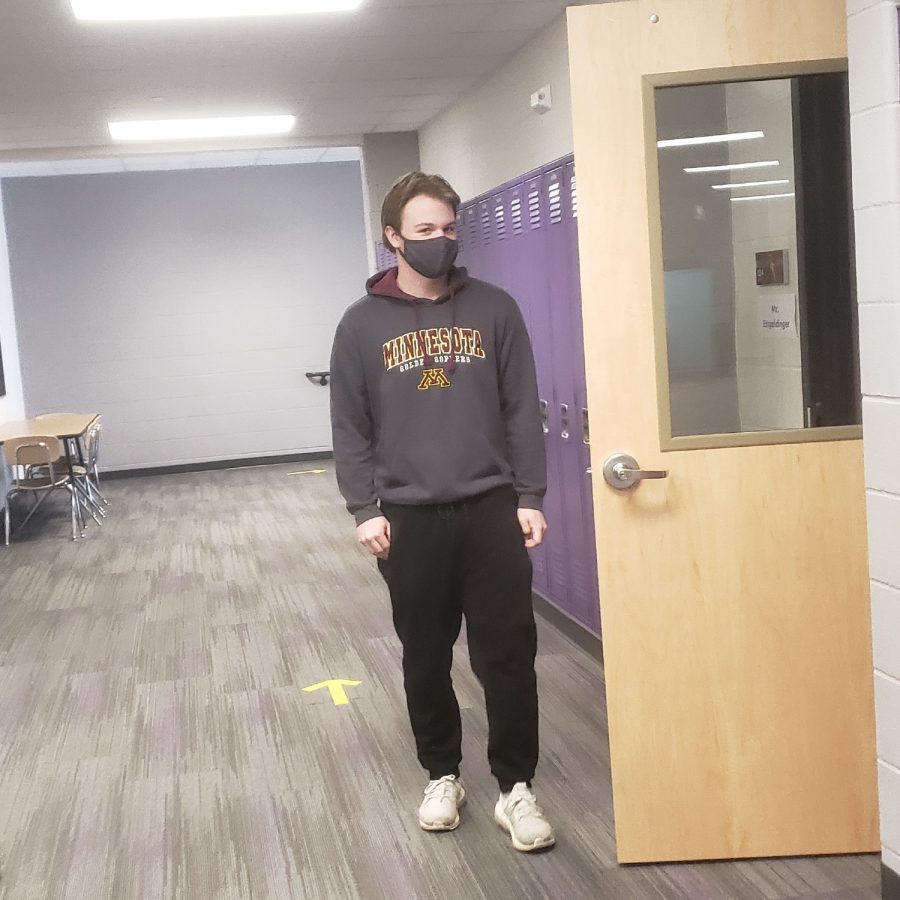 New Ulm High School "Senior", Carson Helget, Boasts Mask While Entering Class.