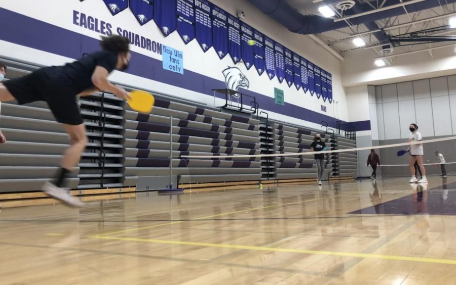 New Ulm students participate in a game of pickleball in the gym on a Wednesday, to further develop their skills for the game. Pickleball is a game rising in popularity as it is a game played by all ages. Even though this game is being played by students here, it is very popular among people above 50. Mr. Lieser said, "The best thing about pickleball is that kids can do it until late in life, and can play it for a lifetime." 