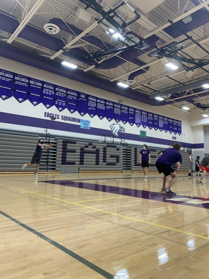 Junior Evan Griebel goes on serving streak in his gym classes volleyball unit in the gym. 