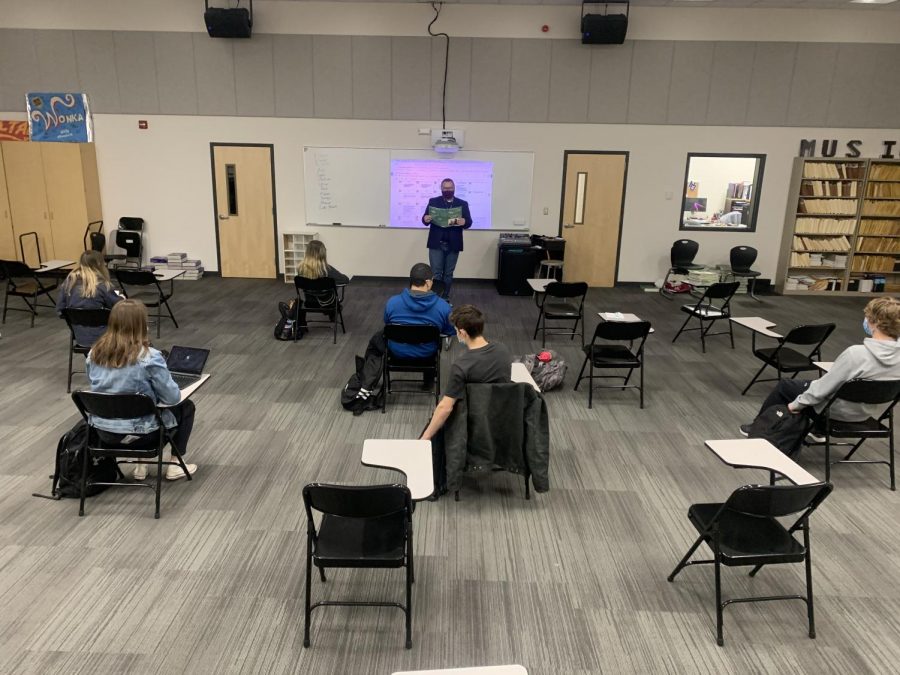 New Ulm High School teacher Mr. Skar reading Shakespeare's Macbeth aloud to his World Lit class