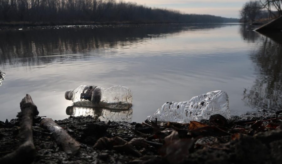 Water Bottles scattered around and in the Minnesota River