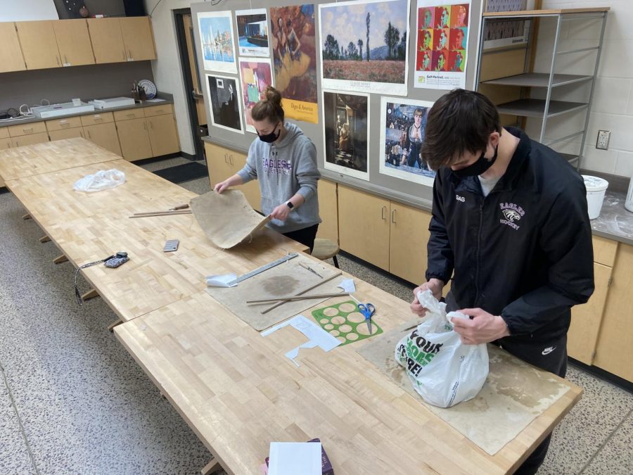 Senior students Nicole Albrecht and Joey Gag utilizing student support days in the art classroom.