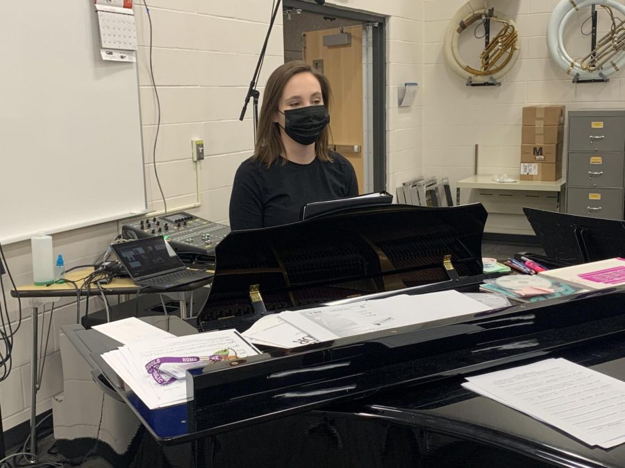 NUHS choir teacher Mrs. Koehler directing choir