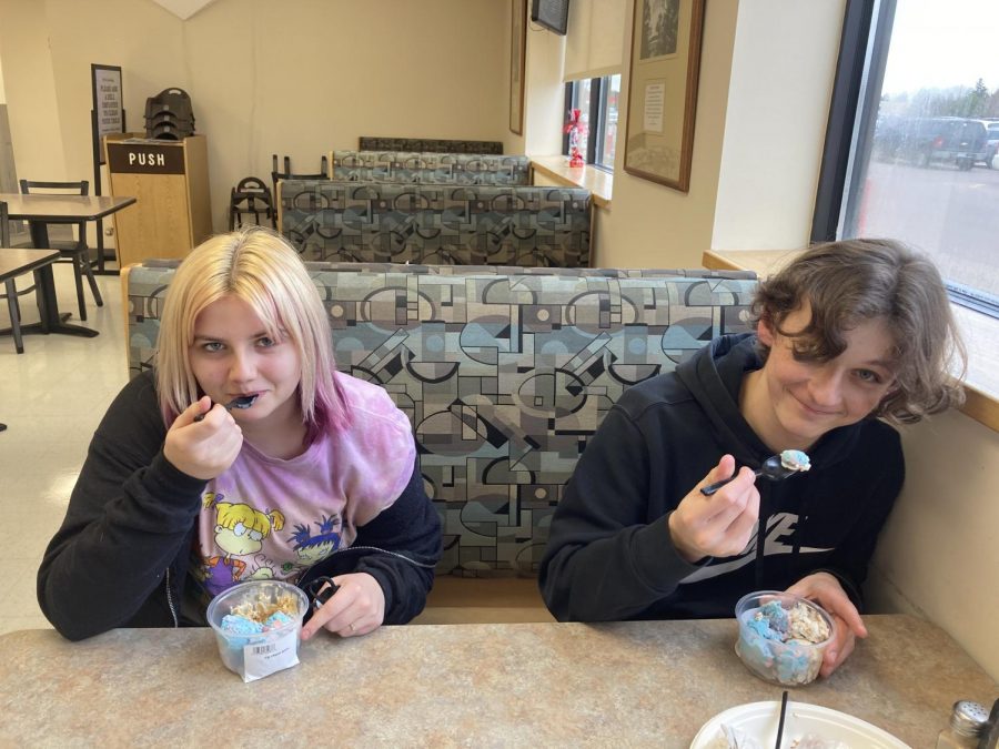 Allie Moline and Matt Miller eating ice cream at Cash Wise. Since many restaurants still don't allow people to dine-in, Cash Wise has "become a good place to eat with friends." Cash Wise offers a variety of foods from the deli including; fresh fried chicken, meats, cheeses, salads, soups, and ice cream. 