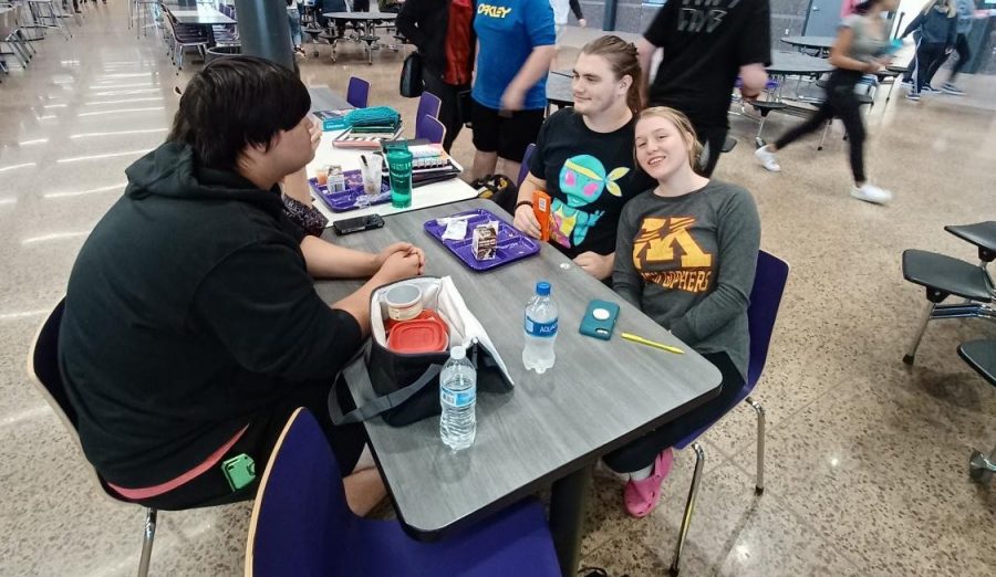 Elliot(middle), Becker(right), and Hill(left),   having lunch in the high school lunchroom, Thur, Sep. 23. 