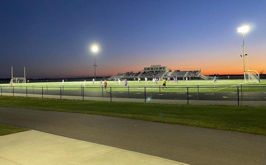 A cool view of the varsity boys' soccer match on a cold night from the concessions stand.