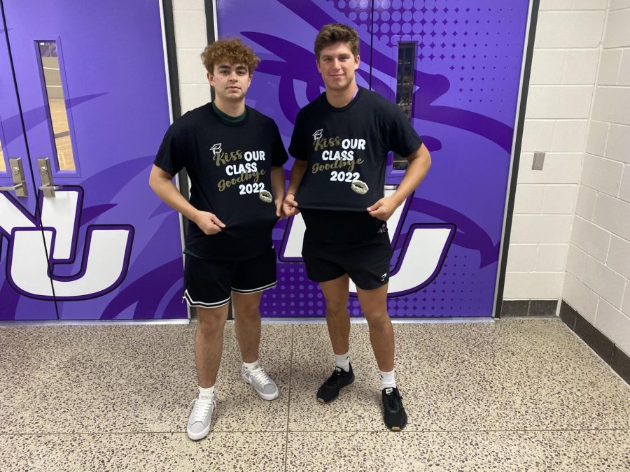 Two students show off their B.O.T.C. shirts!