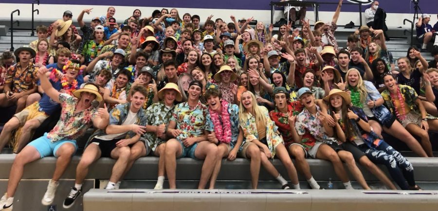 The New Ulm eagles squadron cheering on the volleyball team