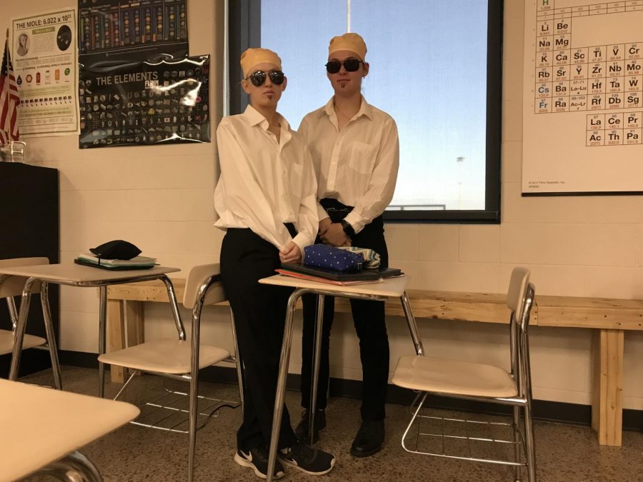 Karson Schmid and Calyn Glaser dress up as Pit Bull (Mr. Worldwide)