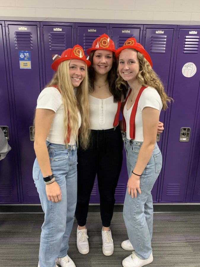 Fire costumes worn by Natalie Yackley, Emma Brudelie, and Maddi O'connor