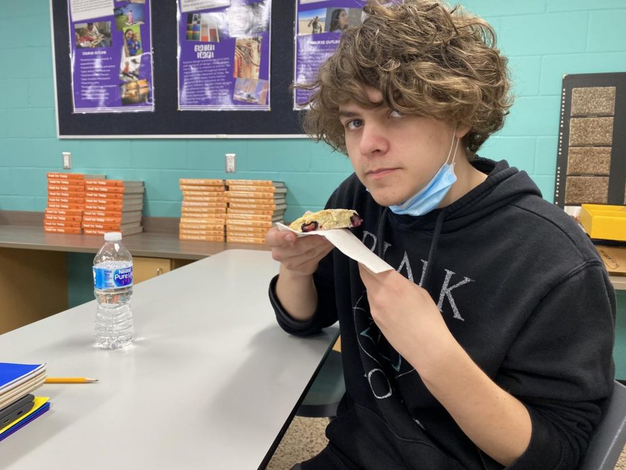 Senior Zennon Smith enjoying some freshly made scones in the midst of a lockdown at NUHS. The students were in the middle of a lab in their 1st hour Pastry and Design class when the announcement went off. "It was short and sweet," Smith said in reference to both the lockdown duration and the baked good.