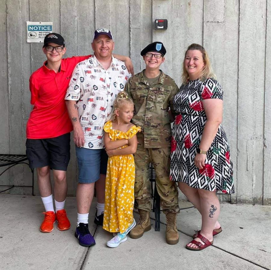 Harley Sjogren posing with her family after graduating basic training.