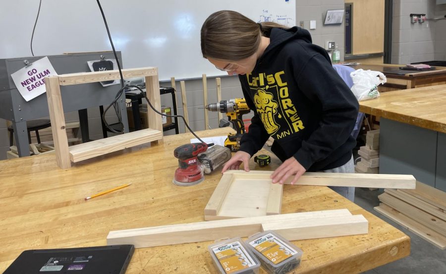Paige Dreckman putting together her final project. 