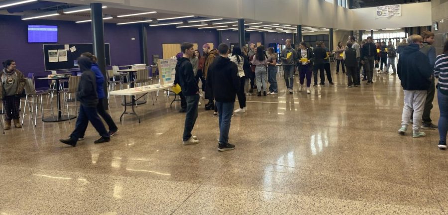 Students attending the school health fair held by Mrs. Longtin's healthful living class. They get to walk around with a bingo sheet going to every table learning about the different topics that are very informational and fun. They get to do different activities and play for a treat! 