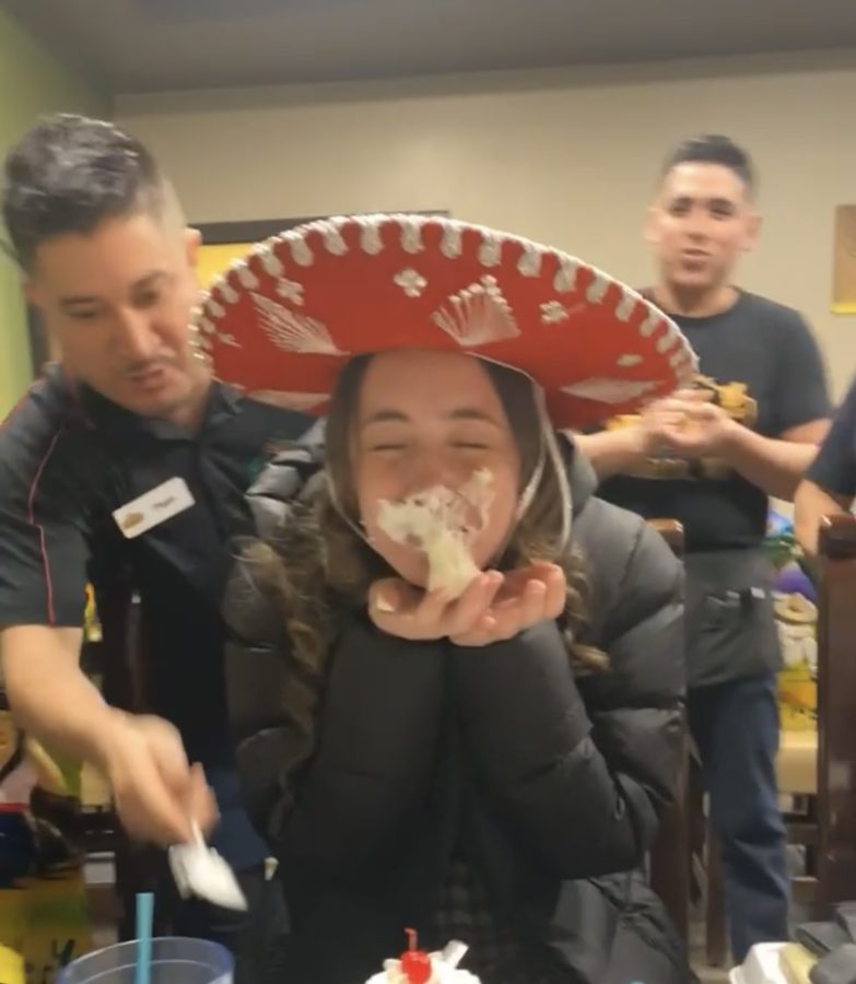 Asia Stade gets whip cream in her face for her birthday on a field trip to Madelia for Spanish 3. 