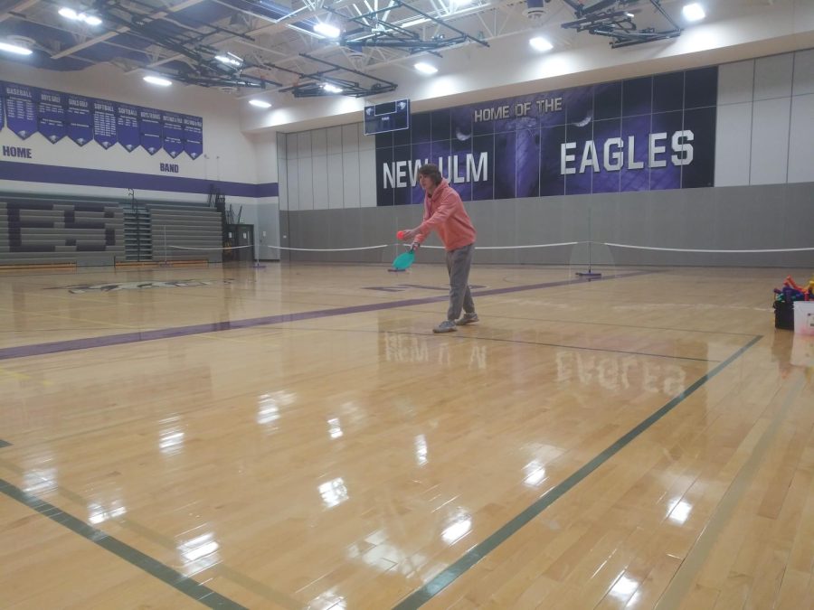 Adian Eckstein gets ready for a serve while playing pickle-ball in the NUHS gymnasium for the fourth annual pickle-ball tournament on Feb. 3, 2022. I love to play pickleball and would like to challenge Mr. Engeldinger," Eckstein said.