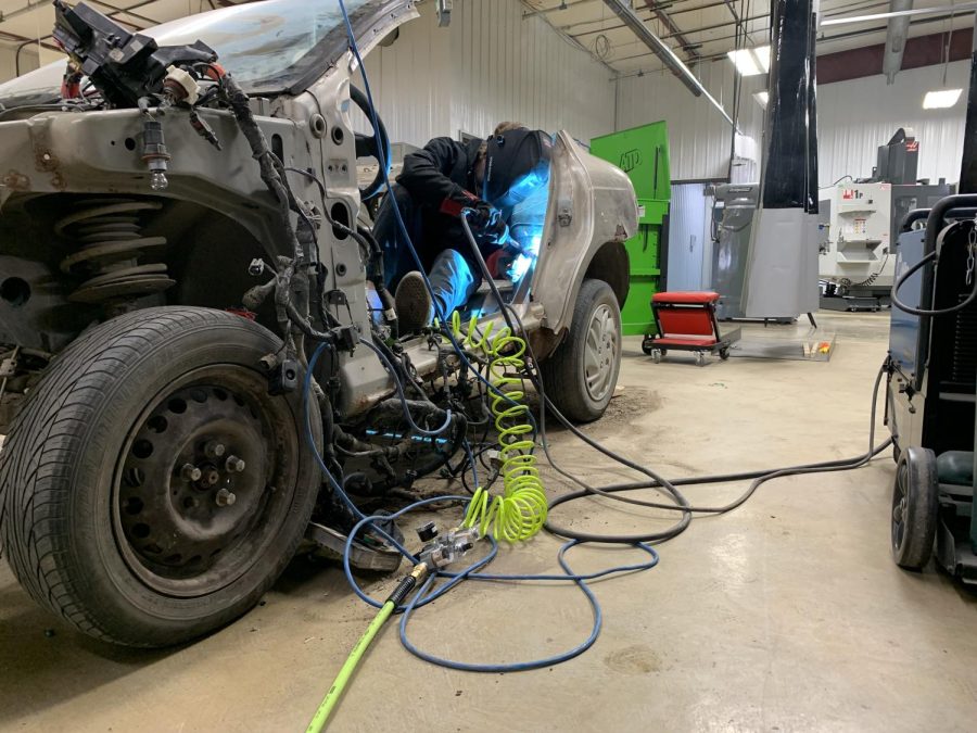 Recently at the C.T.E.  center, seniors Dawson Sowers and Braydon Gibson have split a dodge neon in half and are currently in the process of welding it back together.   "We took this car which was four doors and we are turning it into a two door,"  Gibson said.   The main goal for Gibson and Sowers is to have a running and driving vehicle once they are done.   