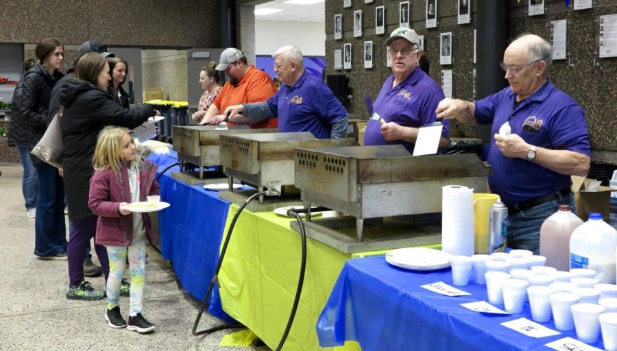 Young looks up to old during the FFA 48th annual pancake breakfast.