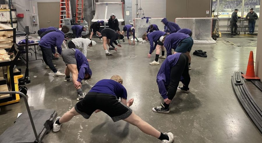 The New Ulm Eagles boys hockey warming up before section championship at the Mavericks arena.