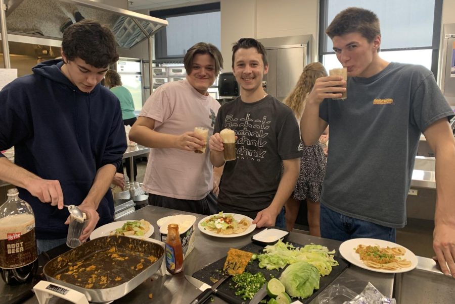 Seniors+Vincent+Leske%2C+Cameron+Sherrod%2C+Tucker+Griebel%2C+and+Jacob+Furth+used+%2420+given+to+them+through+NUHSs+Survival+class+to+budget+for+nachos+and+root+beer+floats+at+the+local+Hy-Vee.+