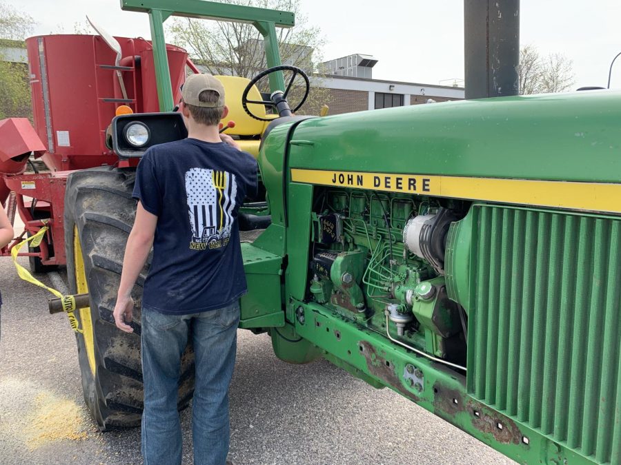 Kolbe Platz presenting how a feed mill works at the FFA spring ag show