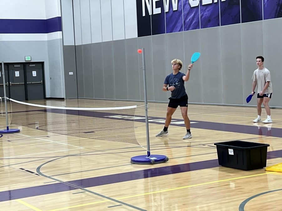 Senior, Leo Waloch, Practices Pickle ball, for Battle of The Classes in the New Ulm High School gym. Hunter Sizer said " This was the very first time Pickle ball was played in BOTC". 