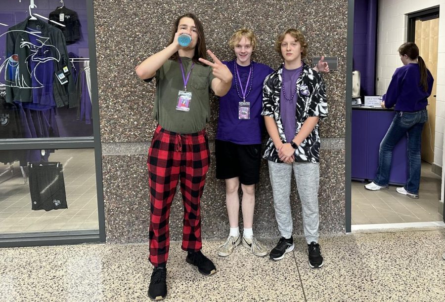 Colin Marti, Shaun Moldan, and Jayden Ludwig posted up outside the school store.