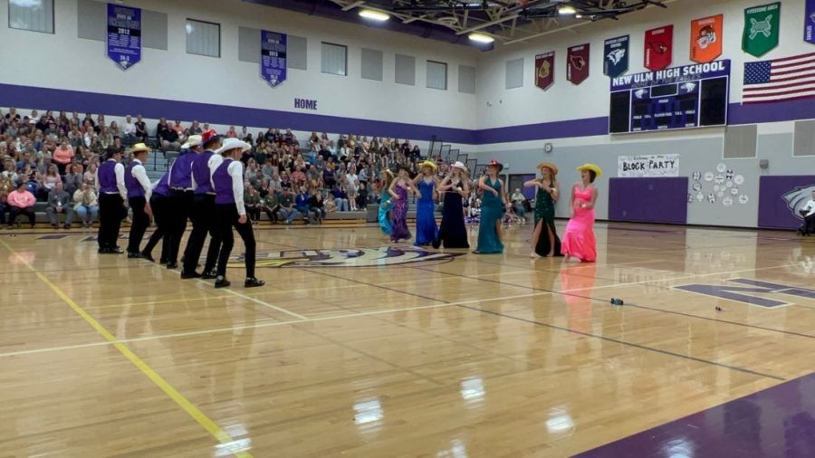 NUHS coronation night, seniors take on the dance. Laura Bertrang and Carson Lewis were announced the Royalty of NUHS.  The court will go around school to school on Friday to perform pep fests at each one. The court will be in the parade prior to the football game. Carson said, "I'm very nervous and excited" for the coronation prior to the dance. 