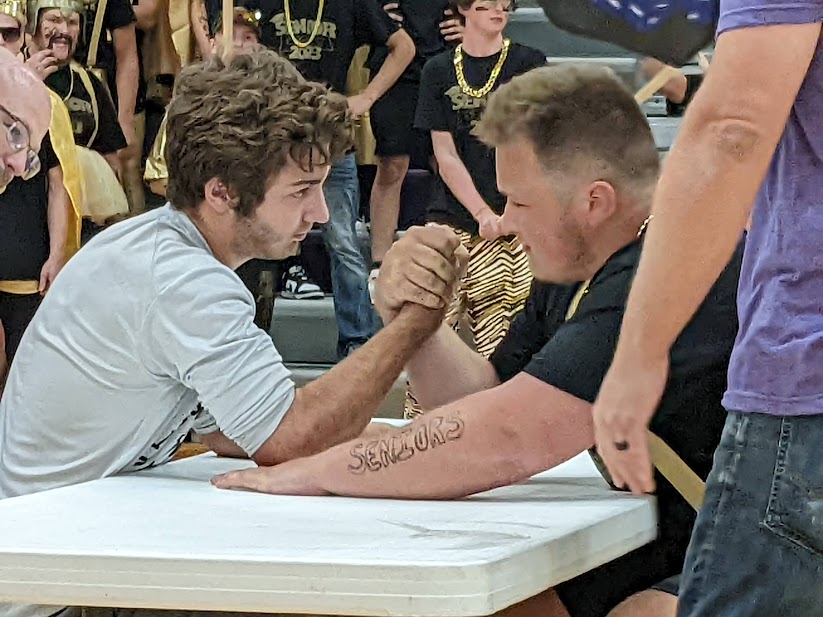 Junior Mark Beranek and Senior Nathan Wolkow competing for first in the Men's Arm Wrestling competition. Mark's goal heading into the competition was to "Stay in as long as possible... I knew I wasn't going to win." It ended after quite some time when Mark's strength, although impressive, was unable to conquer Nathan's own.