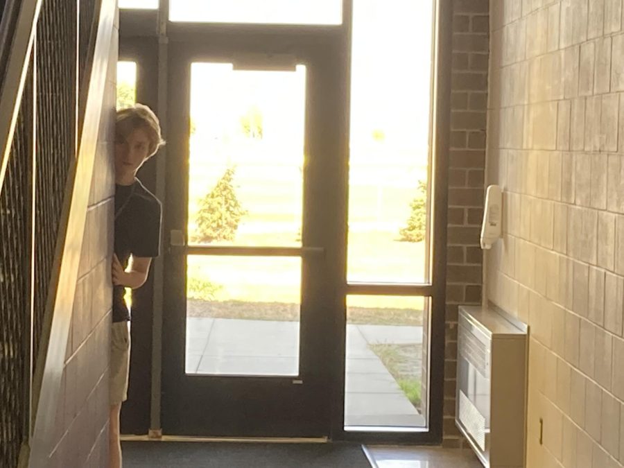 Ghost peaking from behind science and math wing stair case.