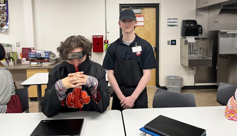 Noah Hamelau (dressed as a Cashwise worker) and Zach Mcfarland (dressed as an anime character)