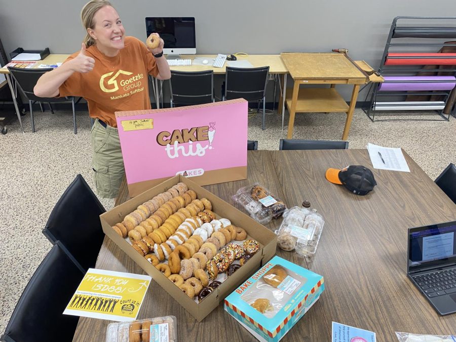 Ms Gunderson decked out on BBQ Dads vs Soccer Moms dress-up day during American Education Appreciation week 